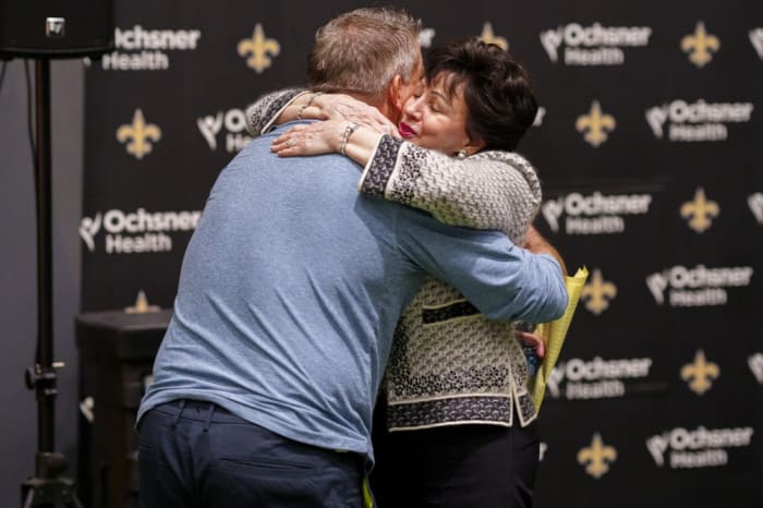 New Orleans Saints head coach Sean Payton hugs team owner Gayle Benson